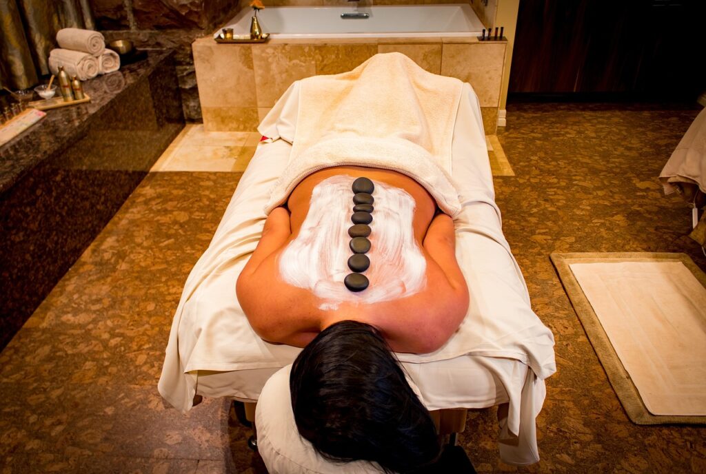 Woman receiving hot stone massage